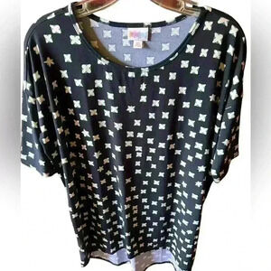 Lularoe XS black Irma tunic length top with cream and teal cross pattern. NWT